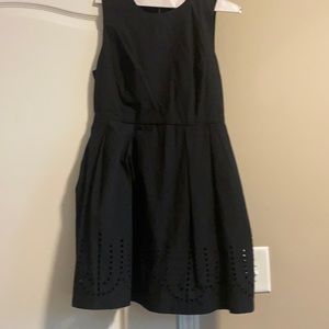 GAP black sleeveless dress with zipper up back and pockets.